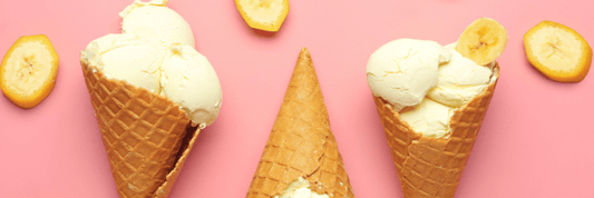 three ice cream cones with pink background and banana slices 