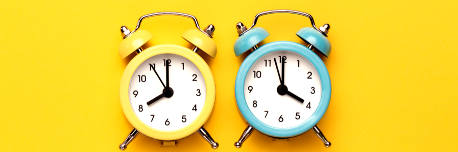 yellow and blue clocks tell time