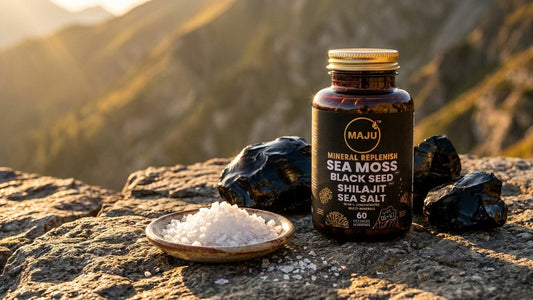 MAJU Mineral Replenish bottle on mountain stone with raw shilajit resin and sea salt