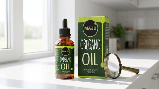 MAJU oregano oil bottle and box with magnifying glass, quality inspection
